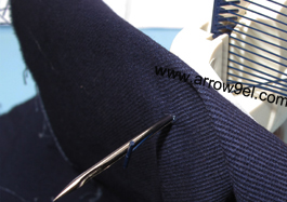 Press the trigger of the tag gun